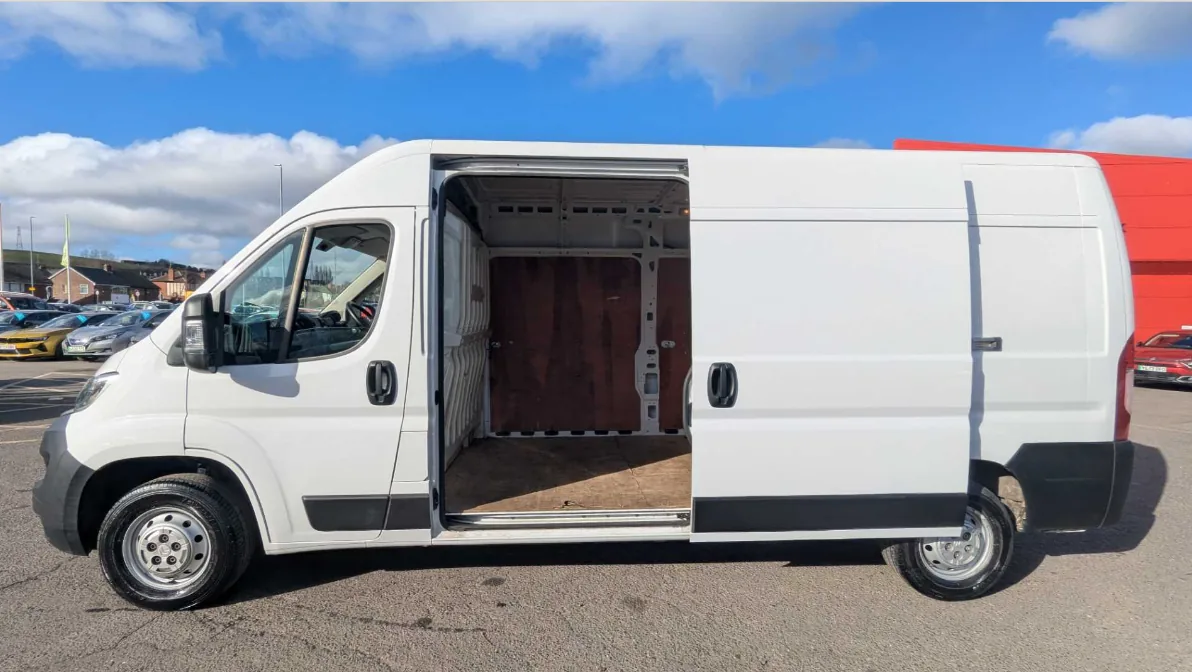 White Citroën Relay L3H2 commercial van with side loading door open